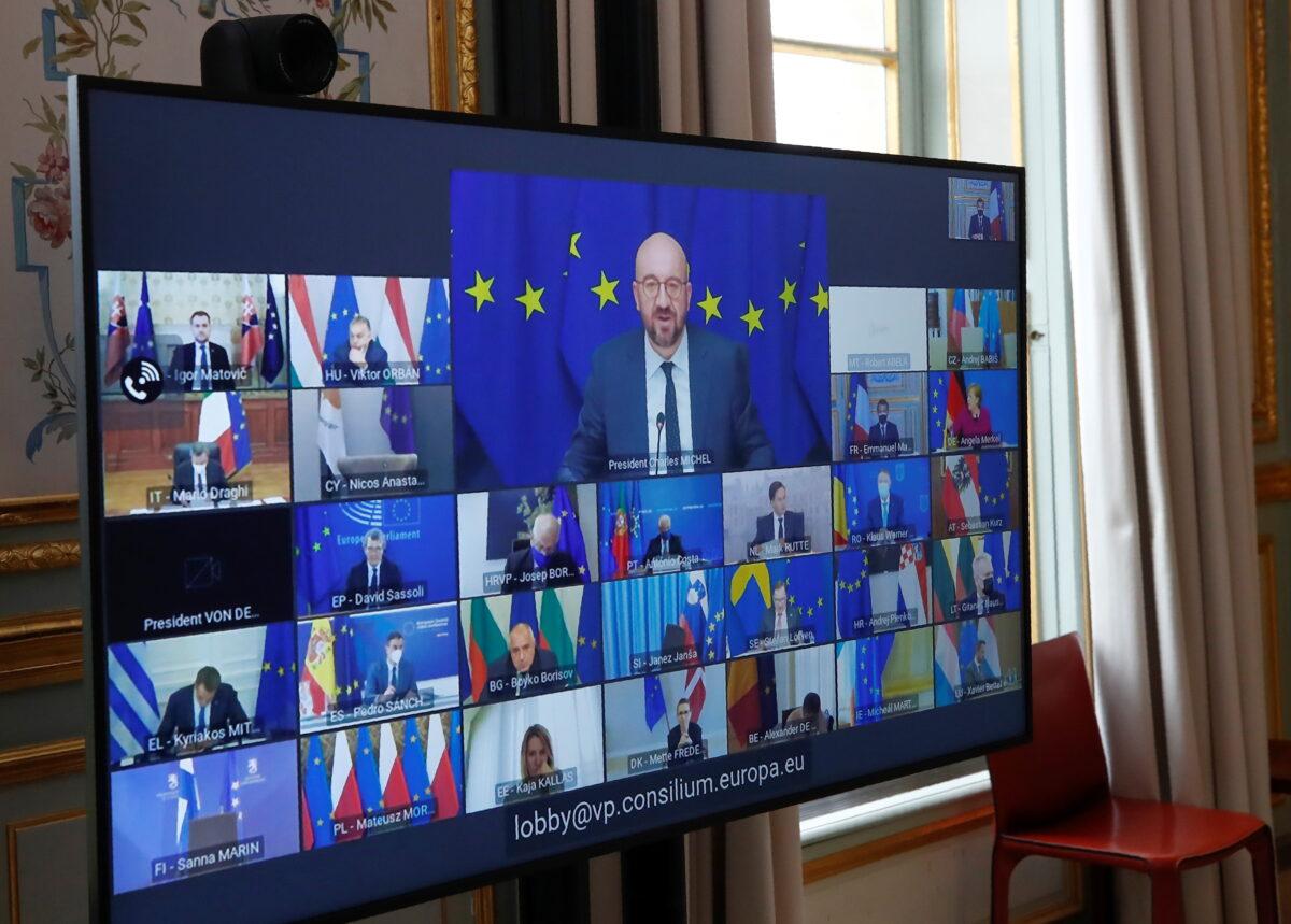 European Council President Charles Michel speaks during an EU summit video conference, as seen on screen at the Elysee Palace in Paris, France, on March 25, 2021. (Michel Euler/Pool via Reuters)