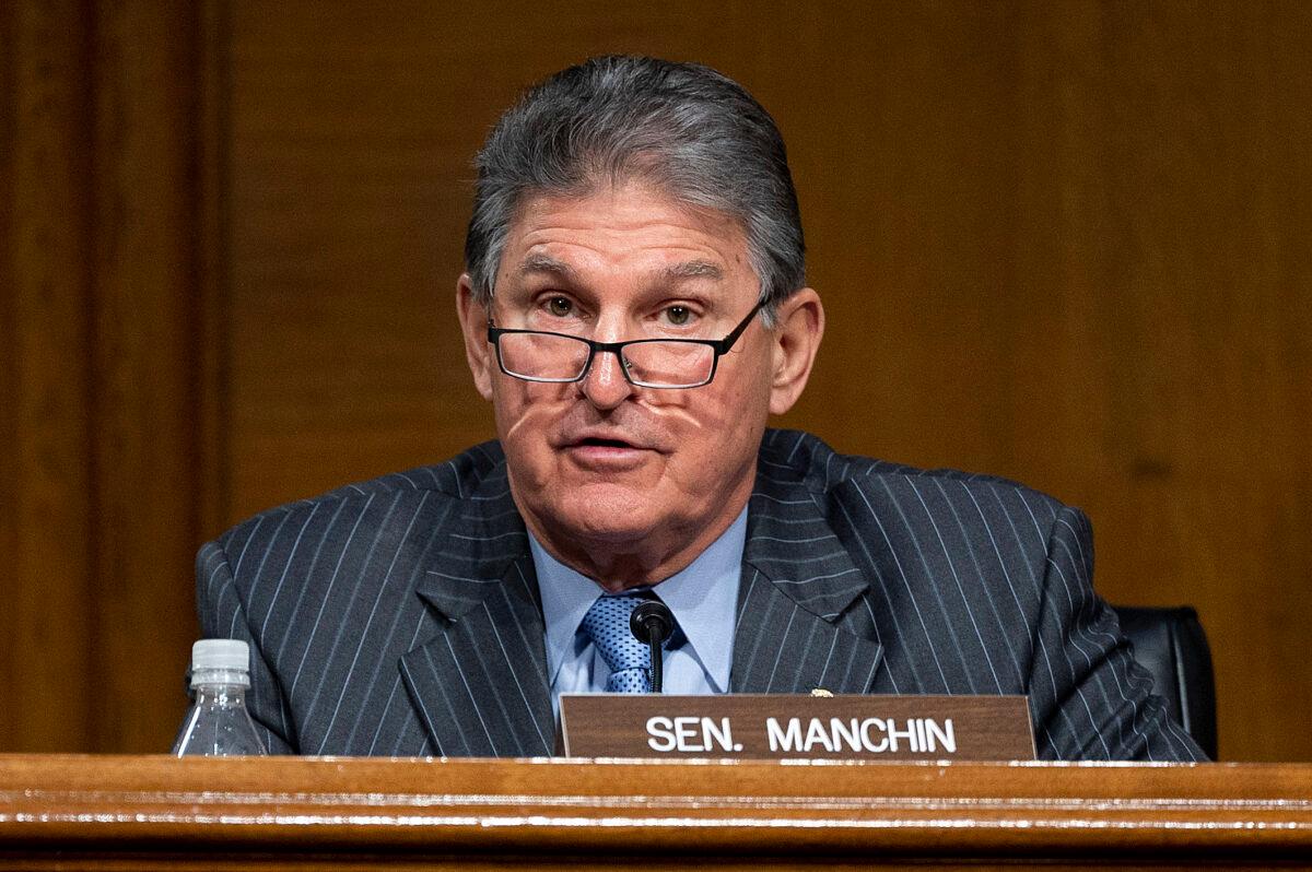 Ranking Member Joe Manchin (D-W.Va.) speaks during a hearing to examine the nomination of Former Michigan Governor Jennifer Granholm to be Secretary of Energy, on Capitol Hill in Washington on Jan. 27, 2021. (Jim Watson/POOL/AFP via Getty Images)
