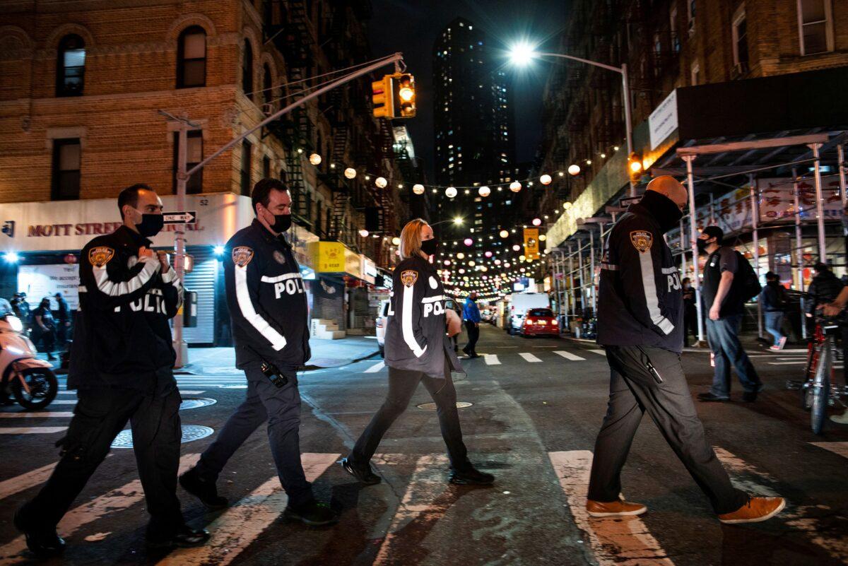 NYPD officers patrol the streets of Chinatown in the Manhattan borough of New York City on March 25, 2021. (Eduardo Munoz/Reuters)