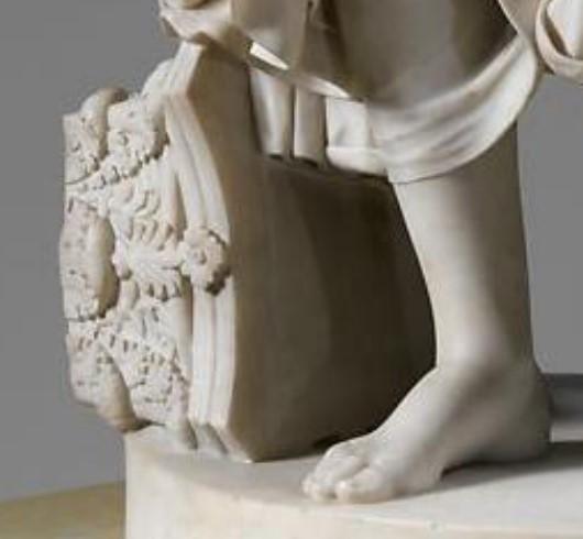 Detail of a downed column’s Corinthian capital by Nydia’s foot, representing the destruction all around her. (Public Domain)