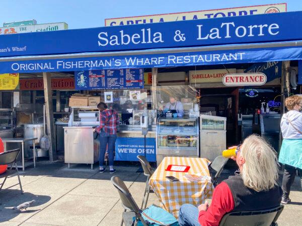 The restaurant Sabella and La Torre at Fisherman’s Wharf in San Francisco on March 25, 2021. The restaurant is seeing about a third of its usual number of customers. (Ilene Eng/The Epoch Times)