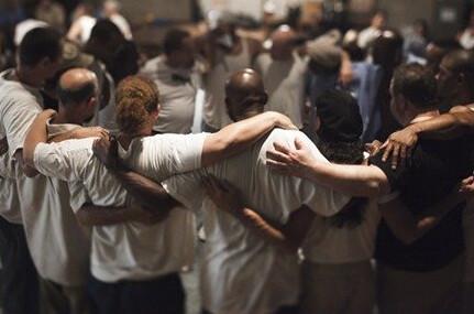 A circle of initiated men: Folsom prison inmates and their new, free world brothers, in "The Work." (SXSW Film Festival)