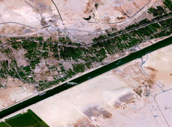 This satellite image from Cnes2021, Distribution Airbus DS, shows the cargo ship MV Ever Given stuck in the Suez Canal near Suez, Egypt, on March 25, 2021. (Cnes2021, Distribution Airbus DS via AP)