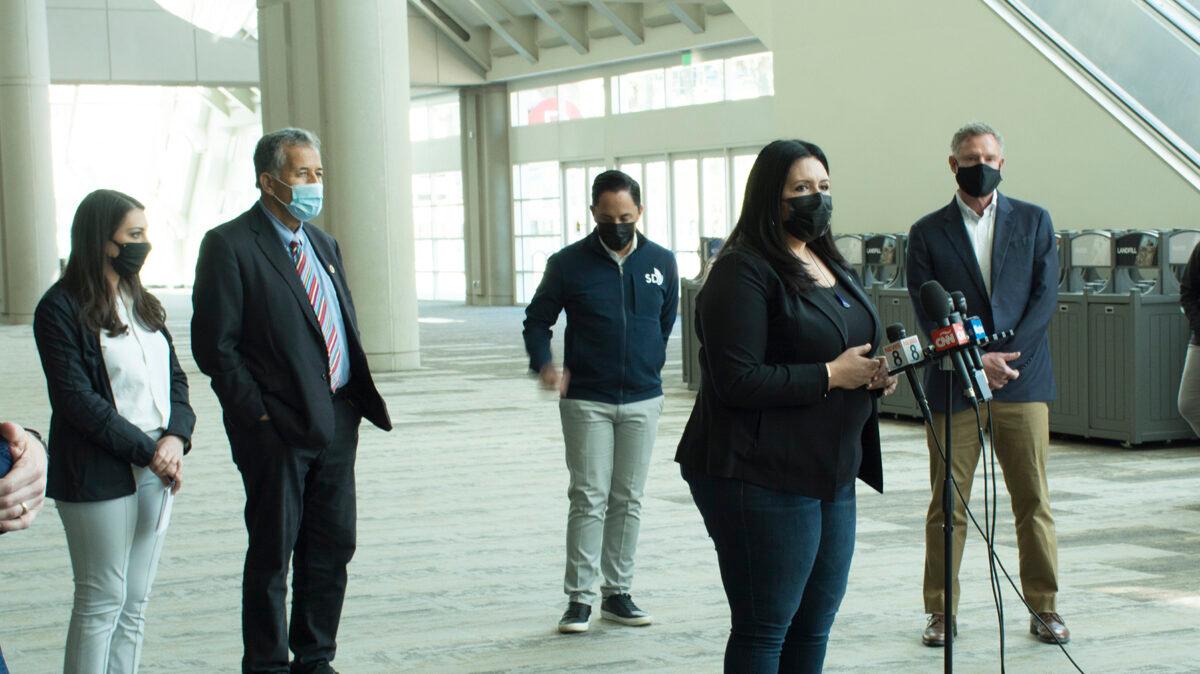(L-R) San Diego congressmen Scott Peters, Juan Vargas, San Diego Mayor Todd Gloria, Vice Chairman of the San Diego County Board of Supervisors Nora Vargas, and Congresswoman Sara Jacobs at the San Diego Convention Center on March 27, 2021. (Jane Yang/Epoch Times)