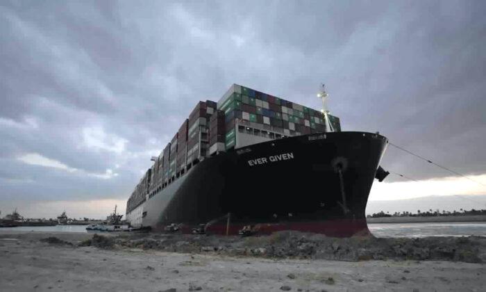 Container Ship Stuck in Suez Canal Partially Refloated