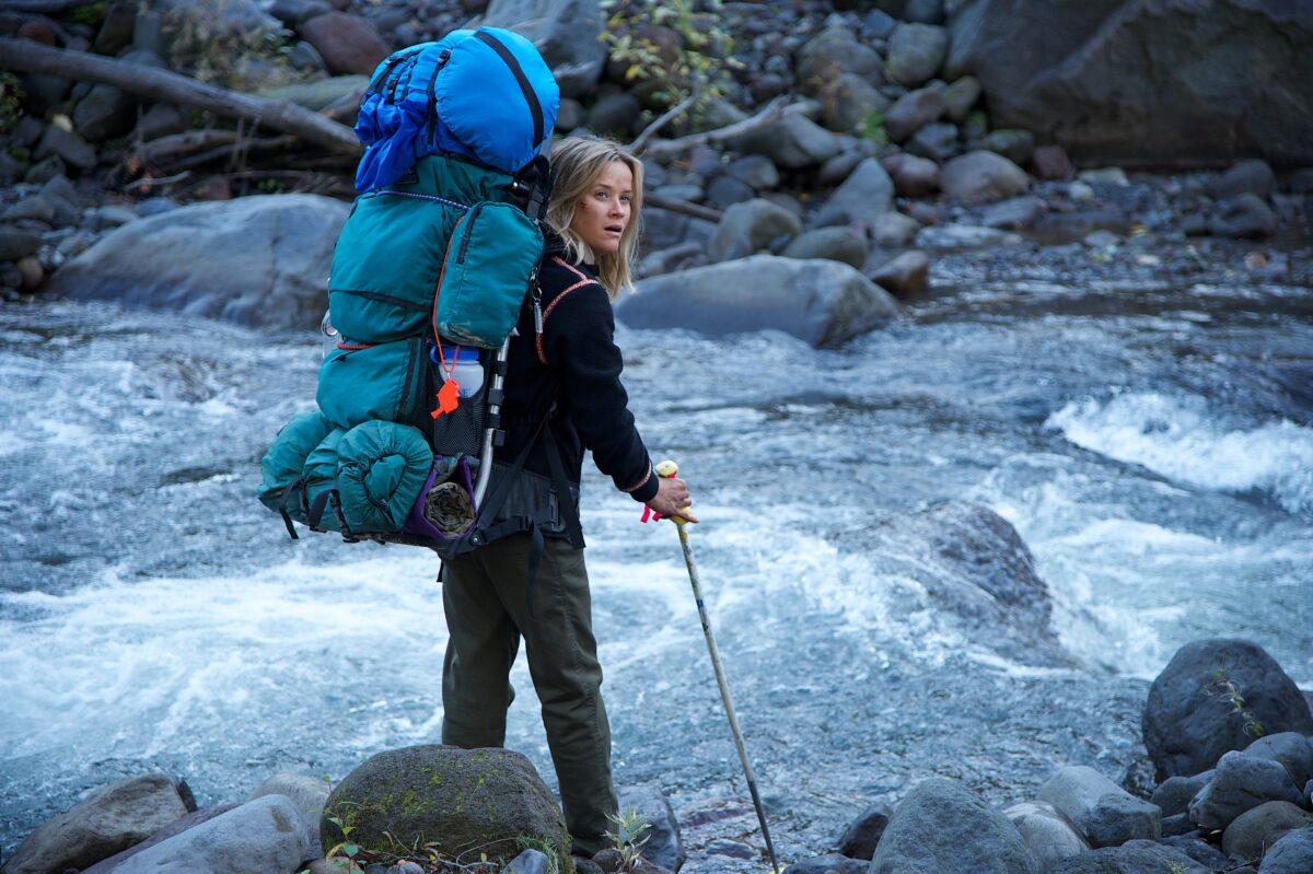 Cheryl Strayed (Reese Witherspoon) fording a stream, in “Wild.” (Fox Searchlight Pictures)