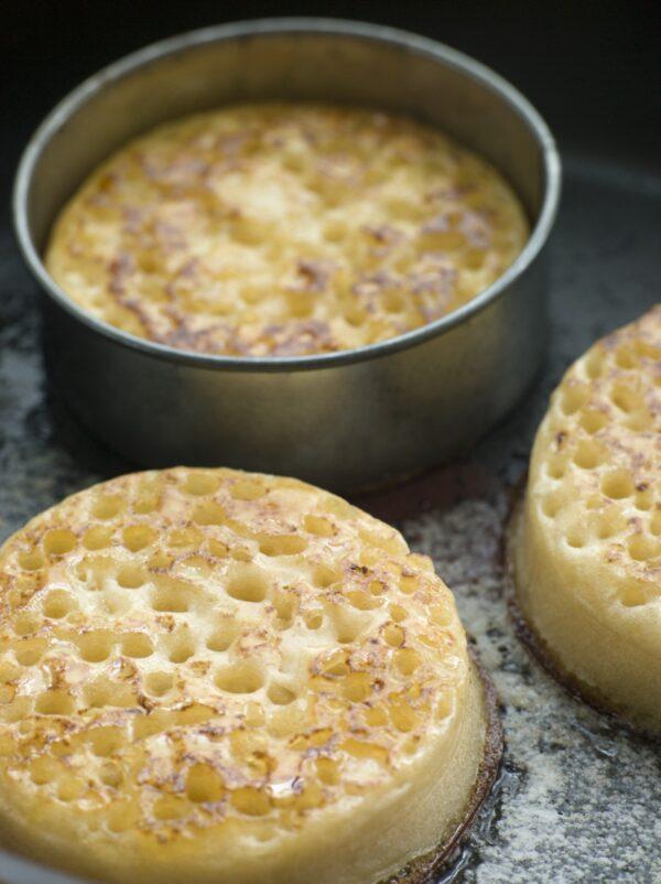 As the crumpets cook, tiny holes should slowly start to appear all across the tops. (Monkey Business Images/Shutterstock)