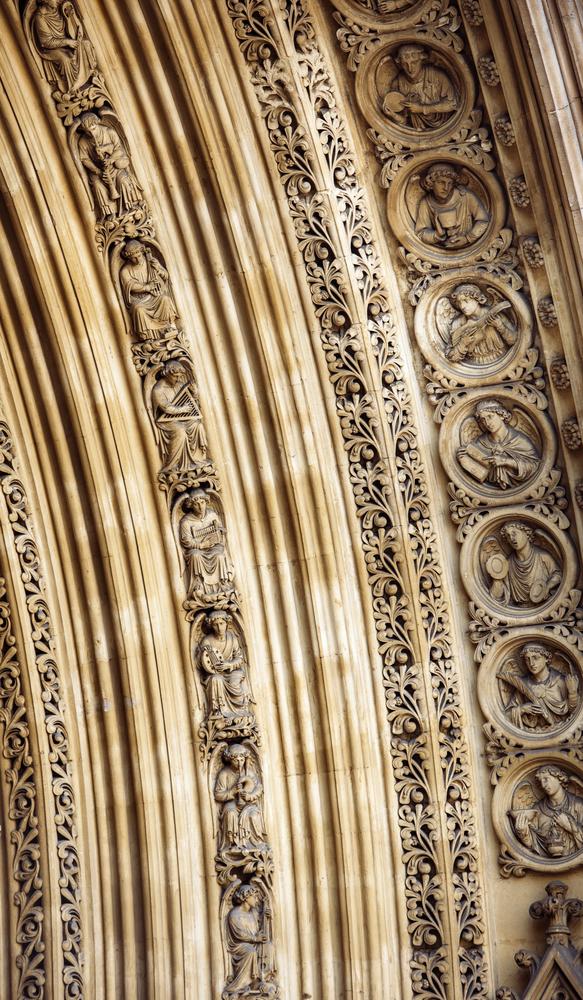 Intricate bas-reliefs adorn the north entrance to Westminster Abbey. (Hadrian/Shutterstock.com)