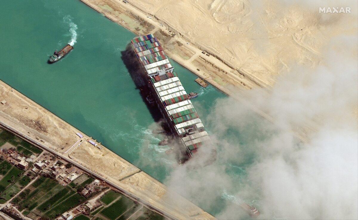 A view shows the Ever Given container ship in Suez Canal, in a Maxar Technologies satellite image taken on March 29, 2021. (Maxar Technologies/Handout via Reuters)