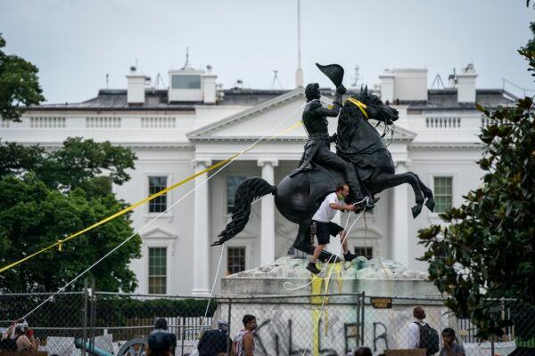 Protesters attempt to pull down the statue of Andrew Jackson in Lafayette Square near the White House in Washington on June 22, 2020. (Drew Angerer/Getty Images)
