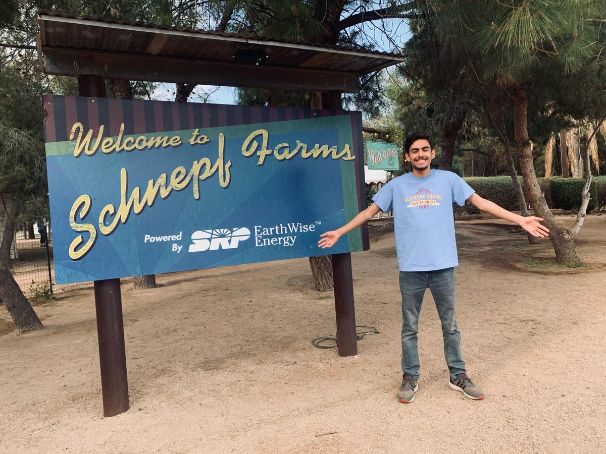 Khobe at his second job greeting visitors at Schnepf Farms. (Courtesy of <a href="https://www.instagram.com/sixdesignsjewelry/">Shalayna Tyre</a>)