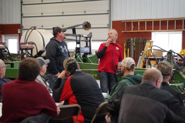 Tony Peirick talks at an educational event for farmers ahead of planting time in Neosha, Wis., on March 26, 2021. (Cara Ding/The Epoch Times)