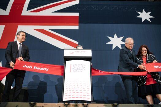Premier of South Australia Steven Marshall, Prime Minister Scott Morrison and Minister for Defence Industry Melissa Price cut the ribbon during the opening of Raytheon Australia's Centre for Joint Integration in Adelaide, Wednesday, March 31, 2021. (AAP Image/Morgan Sette)