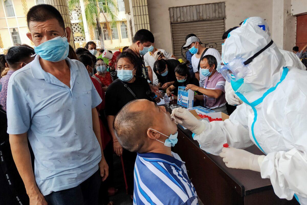 Local residents receive COVID-19 testing in Ruili, southwestern China's Yunnan Province on Sept. 15, 2020. (STR/AFP via Getty Images)