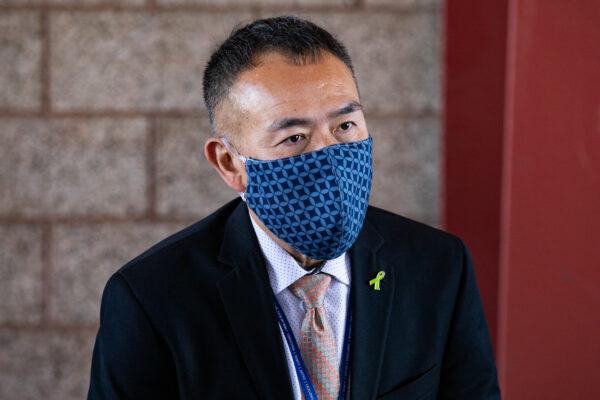 Dr. Clayton Chau speaks on the opening day of a COVID-19 vaccination site at the Orange County Fairgrounds in Costa Mesa, Calif., on March 31, 2021. (John Fredricks/The Epoch Times)