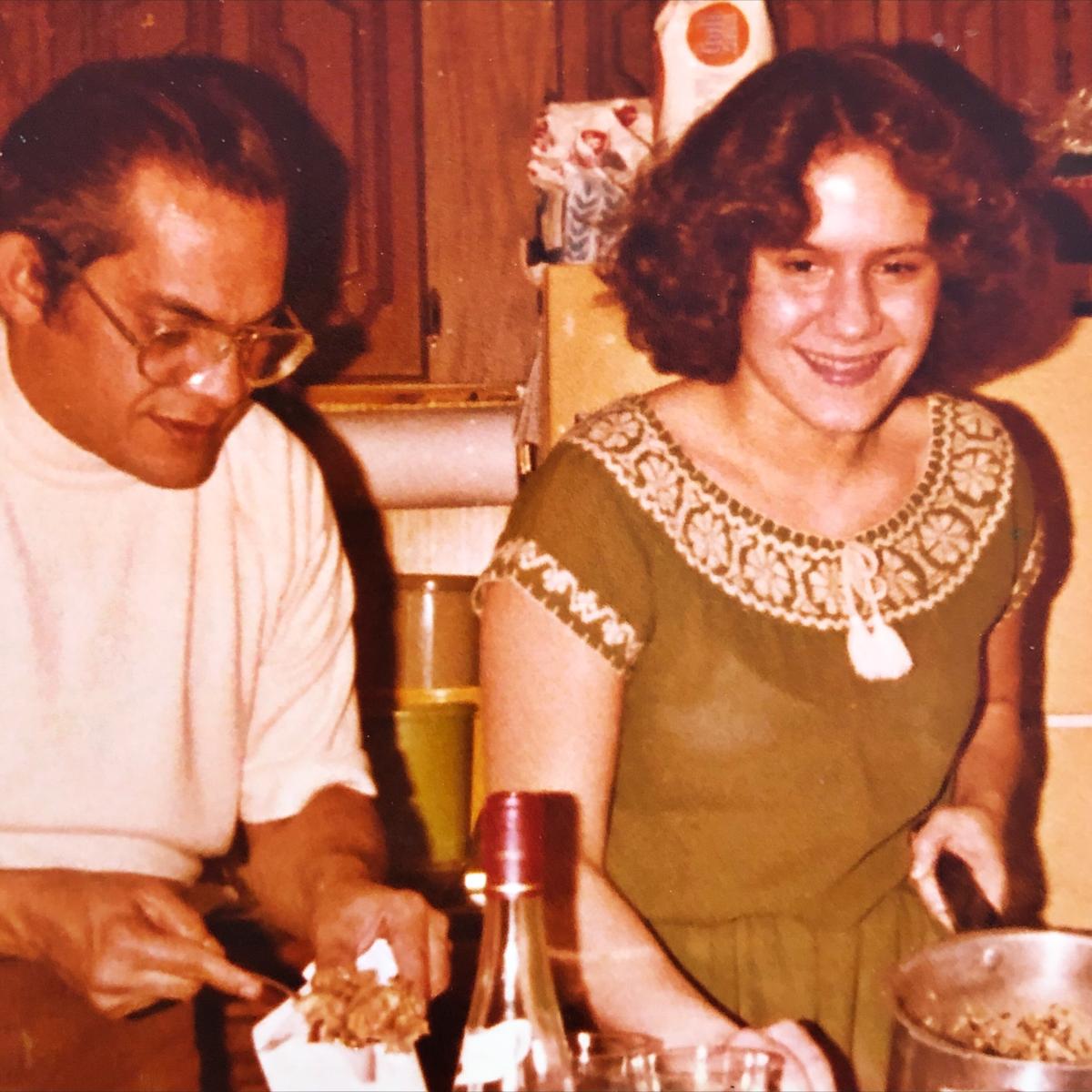 The author's father, Cesar Colon-Bonet, and sister, Denise Colon-Bonet, preparing the family feast together in the spring of 1979. (Courtesy of Cara Colon-McLauchlan)