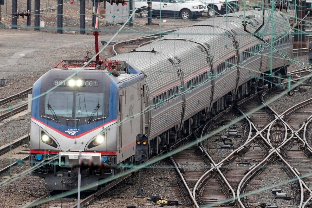An Amtrak train departs 30th Street Station in Philadelphia, Pa., on March 31, 2021. (Matt Rourke/AP Photo)