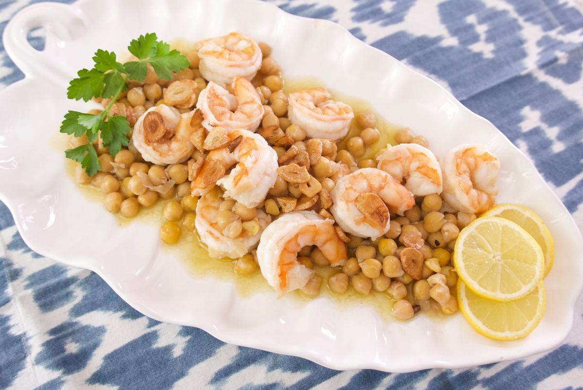 Garlicky shrimp with chickpeas is a classic Spanish tapa. (Victoria de la Maza)