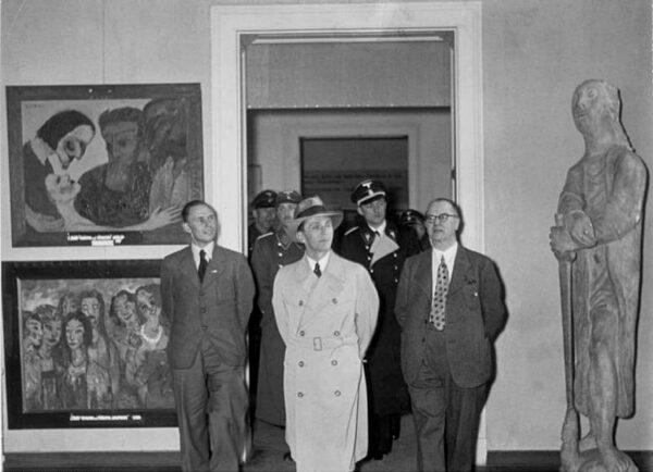 Nazi Propaganda Minister Joseph Goebbels at the “Degenerate Art” Exhibition in Munich 1938. Photograph, Taken on 27 February 1938, German Federal Archives. (Public Domain)