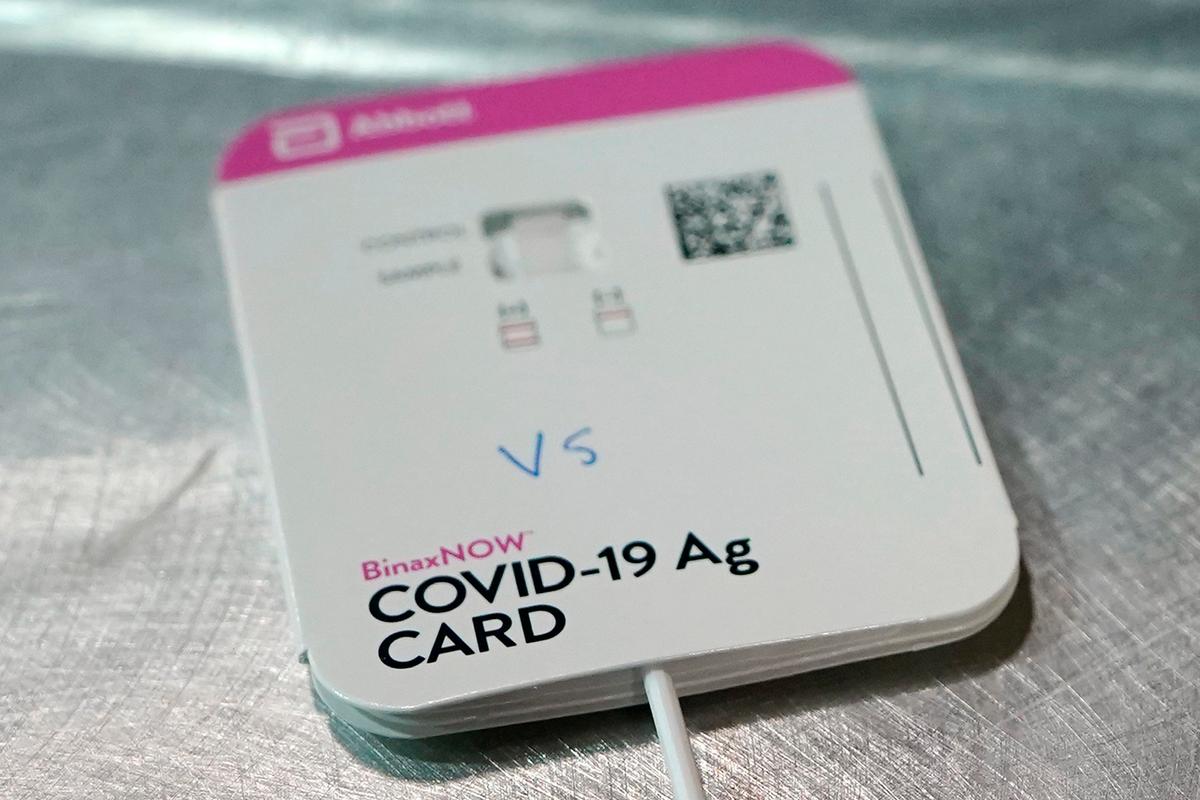 A BinaxNOW rapid COVID-19 test made by Abbott Laboratories is shown in Tacoma, Wash., on Feb. 3, 2021. (Ted S. Warren/AP Photo)