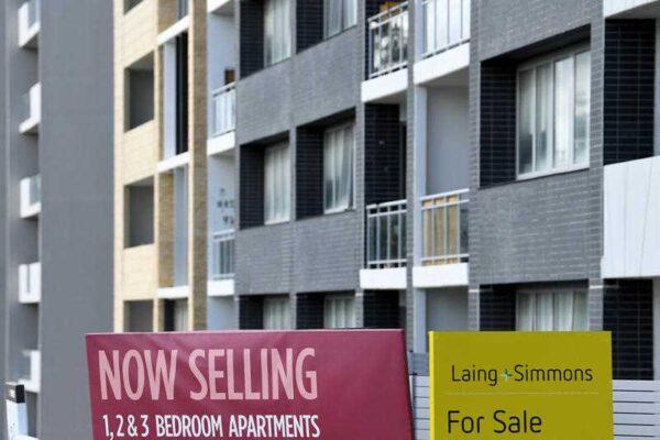 For Sale signs are seen outside a unit block in Sydney, Australia, Oct. 28, 2020. (AAP Image/Dan Himbrechts)