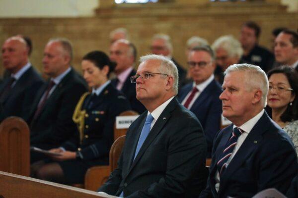  Former Prime Minister Scott Morrison and former Deputy Prime Minister Michael McCormack attend a Parliamentary church service at the St Christopher's Catholic Cathedral in Canberra, Australia, on Feb. 2, 2021. (Dominic Lorrimer/Pool/Getty Images)