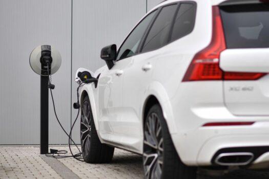A Volvo XC60 hybrid car is plugged into a charging point outside a Volvo dealership in Reading, west of London, on March 2, 2021. - Chinese-owned Swedish automaker Volvo said on March 2 it will produce only electric vehicles by 2030 and sell them all exclusively online. (Ben Stansall/AFP via Getty Images)