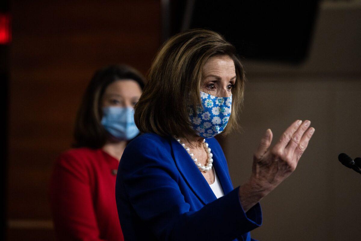 House Speaker Nancy Pelosi (D-Calif.) speaks to reporters on Capitol Hill in Washington on March 19, 2021. (Graeme Jennings/Pool/AFP via Getty Images)