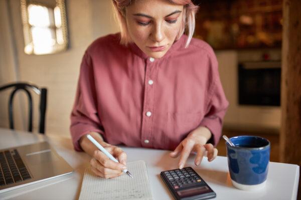 You can create an aggressive but realistic plan to pay your student loans. (Anatoliy Karlyuk/Shutterstock)