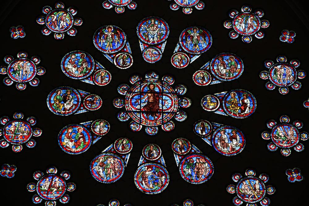 The Last Judgment is shown in the west rose window, which was created around 1215. (Anyamuse/Shutterstock)