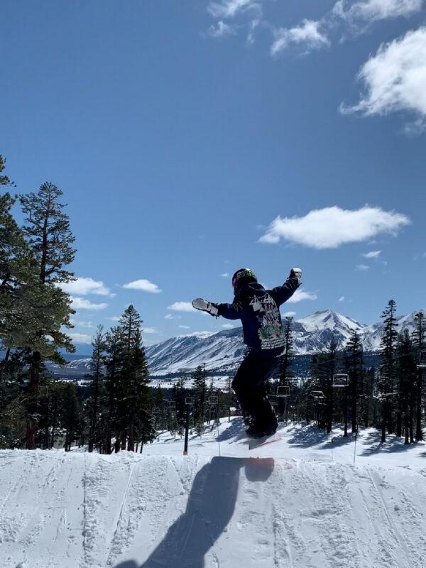 The author's son jumps on a snowboard at Mammoth Mountain, Calif. (Courtesy of Margot Black)