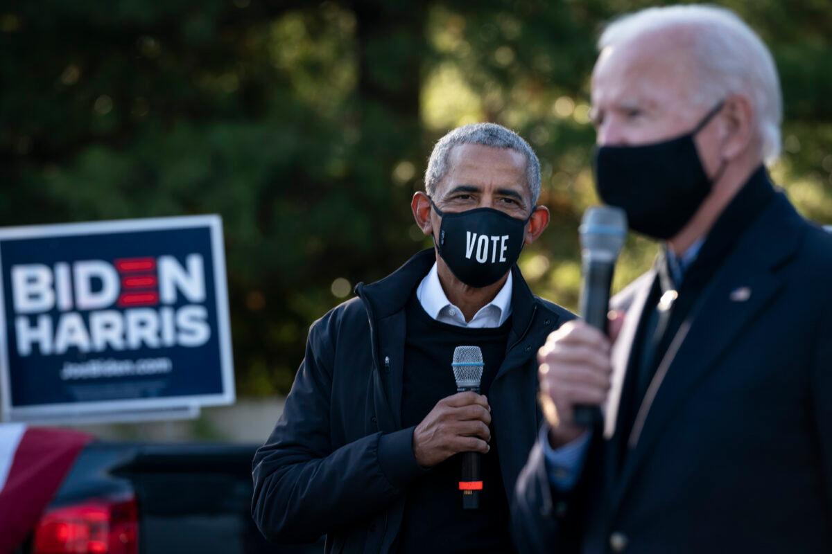 Former Vice President Joe Biden and former President Barack Obama make a stop at a canvass kickoff event at Birmingham Unitarian Church in Bloomfield Hills, Mich., on Oct. 31, 2020. (Drew Angerer/Getty Images)