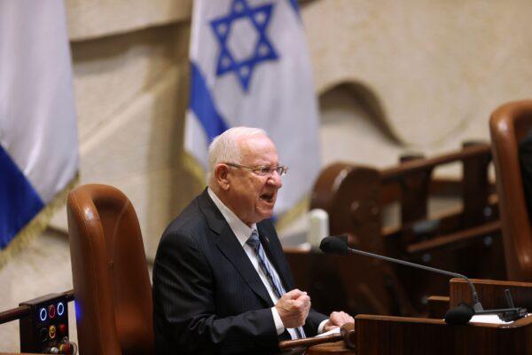 Israeli President Reuvan Rivlin speaks during the swearing-in ceremony for Israel's 24th government, at the Knesset, or parliament, in Jerusalem, Israel, on April 6, 2021. (Alex Kolomoisky/Pool via AP)
