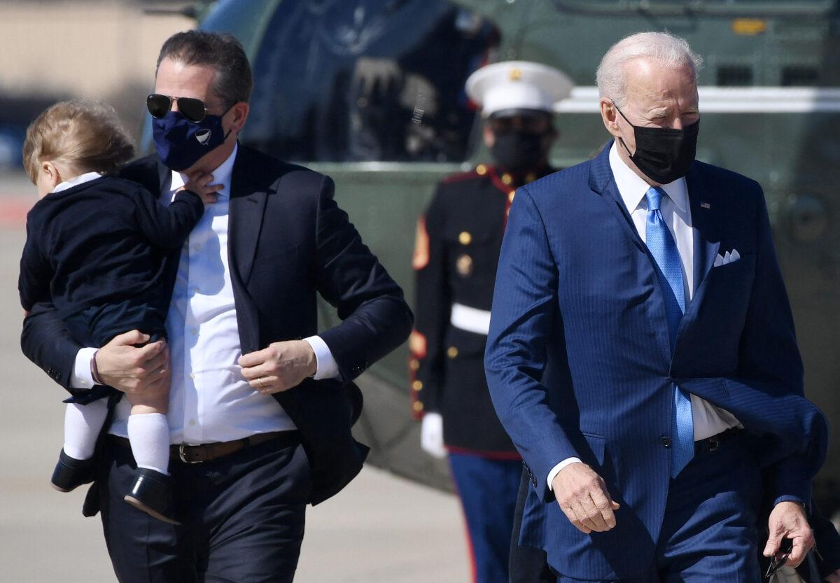 Hunter Biden (L) travels with President Joe Biden to board Air Force One at Joint Base Andrews, Md., on March 26, 2021. (Olivier Douliery/AFP via Getty Images)