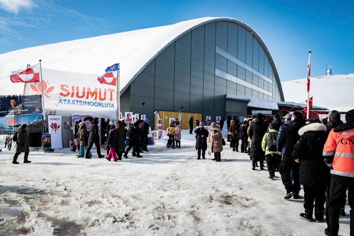 People queue to vote, in the Inussivik arena in Nuuk, Greenland, on April 6, 2021. (Emil Helms/Ritzau Scanpix via AP)