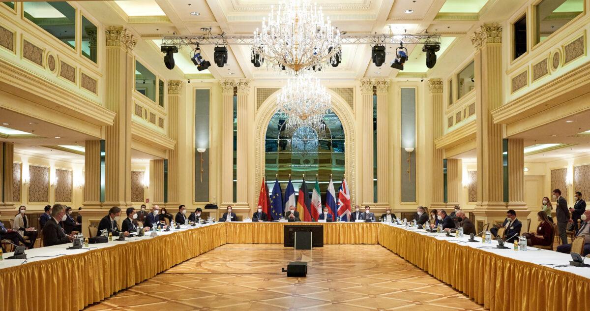 In this handout provided by the EU delegation in Vienna, representatives of the European Union, Iran, and others attend the Iran nuclear talks at the Grand Hotel, in Vienna, on April 6, 2021. (EU Delegation in Vienna via Getty Images)