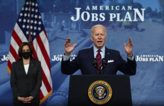 President Joe Biden speaks about jobs and the economy as Vice President Kamala Harris listens, at the White House in Washington on April 7, 2021. (Alex Wong/Getty Images)