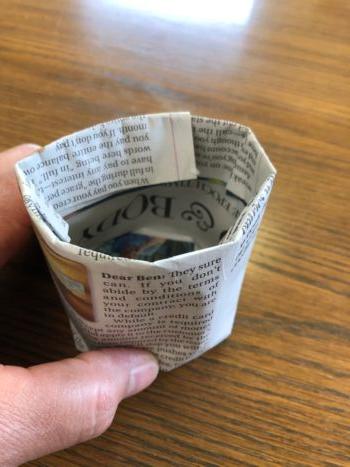 Slide the can out of your newly formed pot and fold down the top edges. (Matt Fowler)