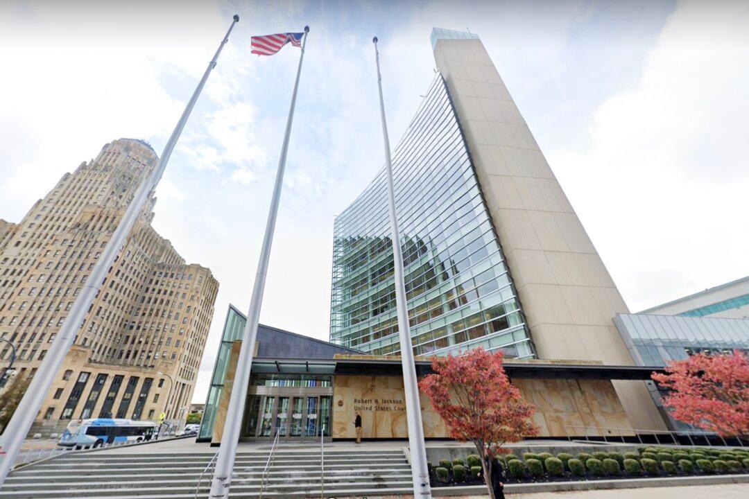 Photographer Challenges New York Law Barring Faith Objections to Working Gay Weddings