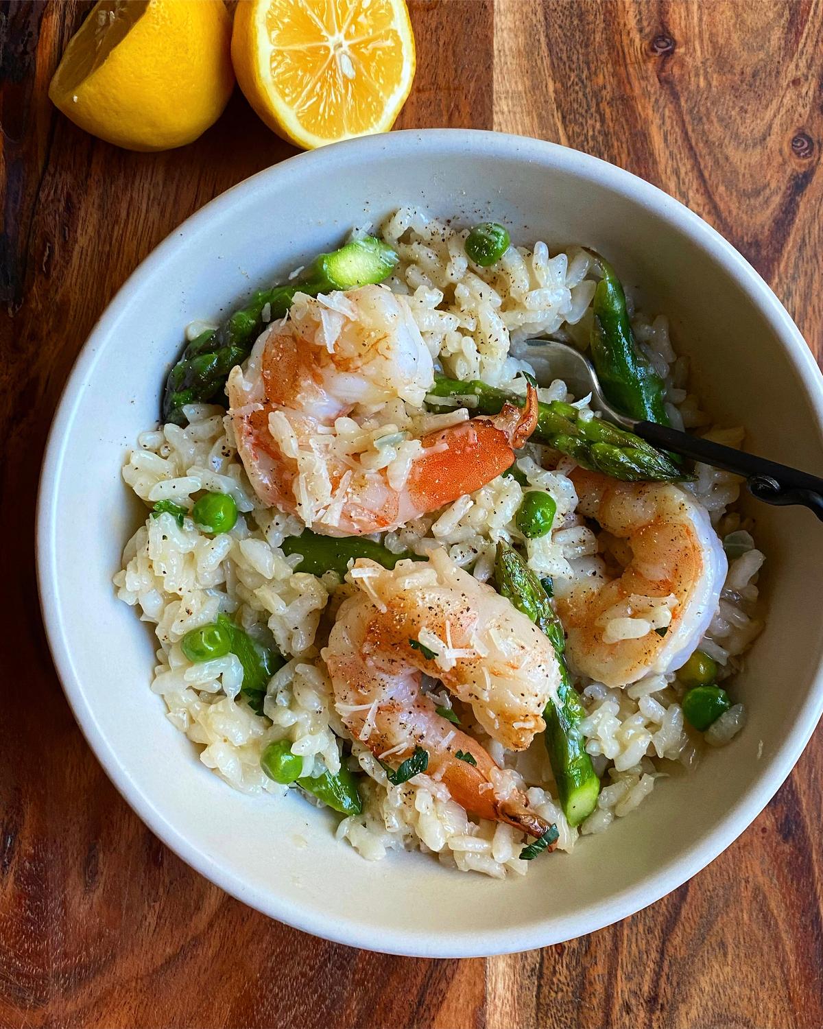  This risotto takes inspiration from pasta primavera, with fresh asparagus and peas studding the rice, along with sweet briny shrimp and juicy Meyer lemon. (Lynda Balslev for Tastefood)