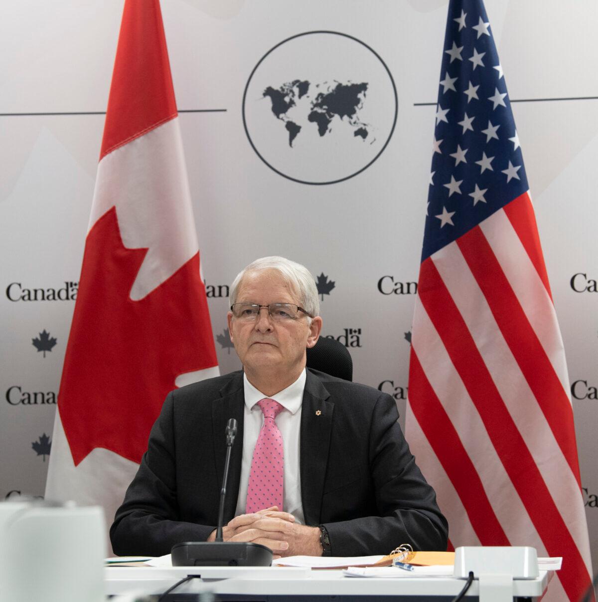 Foreign Affairs Minister Marc Garneau waits for a virtual meeting to begin with U.S. Secretary of State Antony Blinken in Ottawa on Feb. 26, 2021. (Adrian Wyld/The Canadian Press)