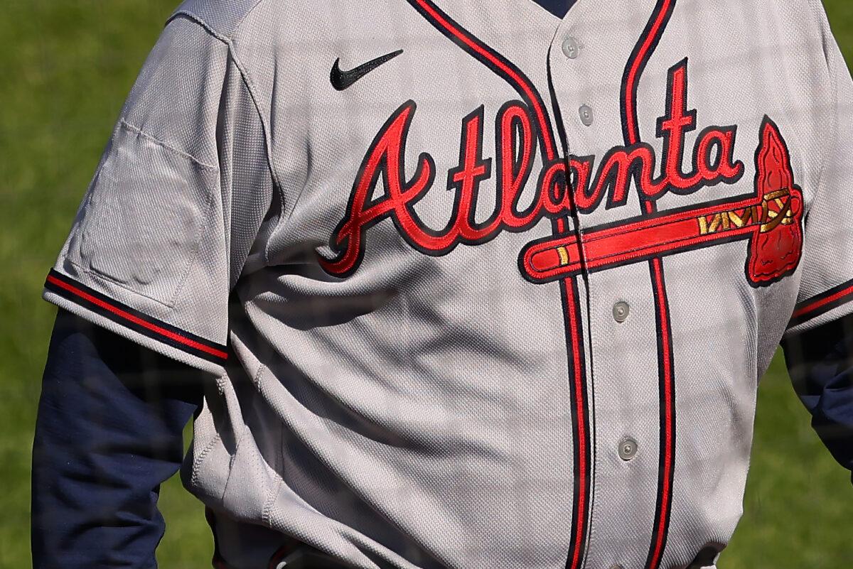 The All-Star Game logo is covered up on the right sleeve of manager Brian Snitker #43 of the Atlanta Braves during a baseball game against the Philadelphia Phillies at Citizens Bank Park in Philadelphia, Pennsylvania, on April 4, 2021. (Rich Schultz/Getty Images)