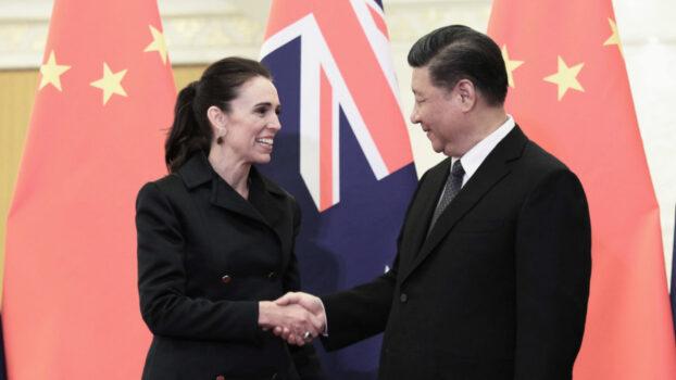 Chinese President Xi Jinping, right and New Zealand Prime Minister Jacinda Ardern, left shake hands before the meeting at the Great Hall of the People on April 1, 2019 in Beijing, China. (Kenzaburo Fukuhara - Pool/Getty Images)