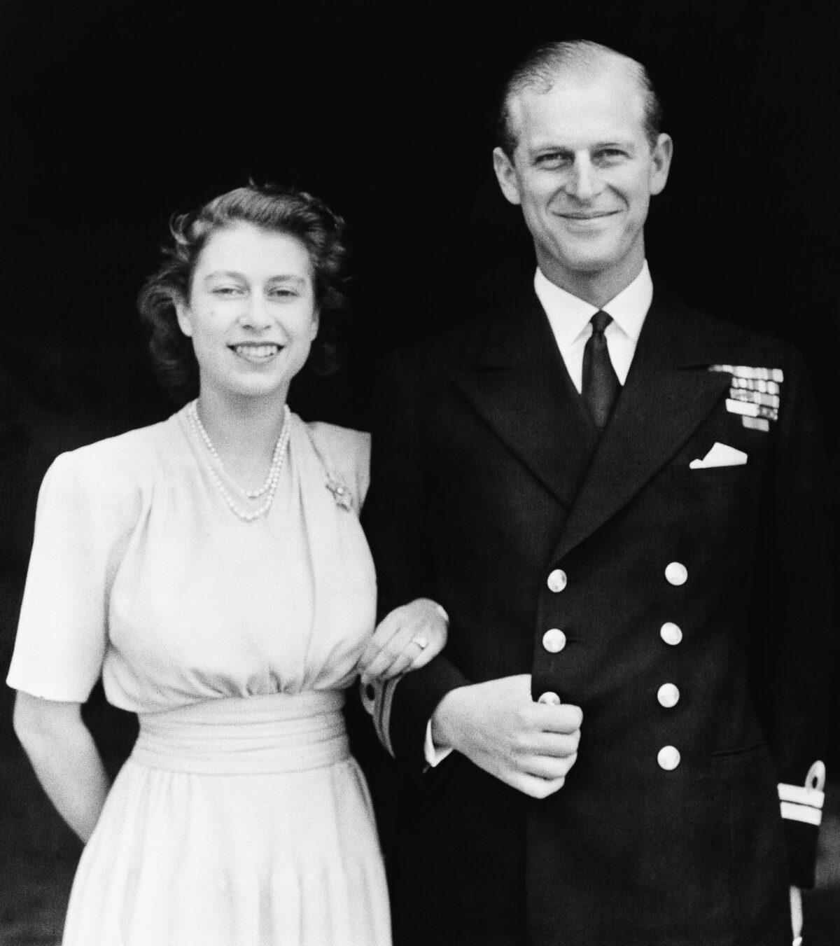 An official photograph of Britain's Princess Elizabeth and her fiance, Lieut. Philip Mountbatten in London on July 10, 1947. (AP Photo/File)