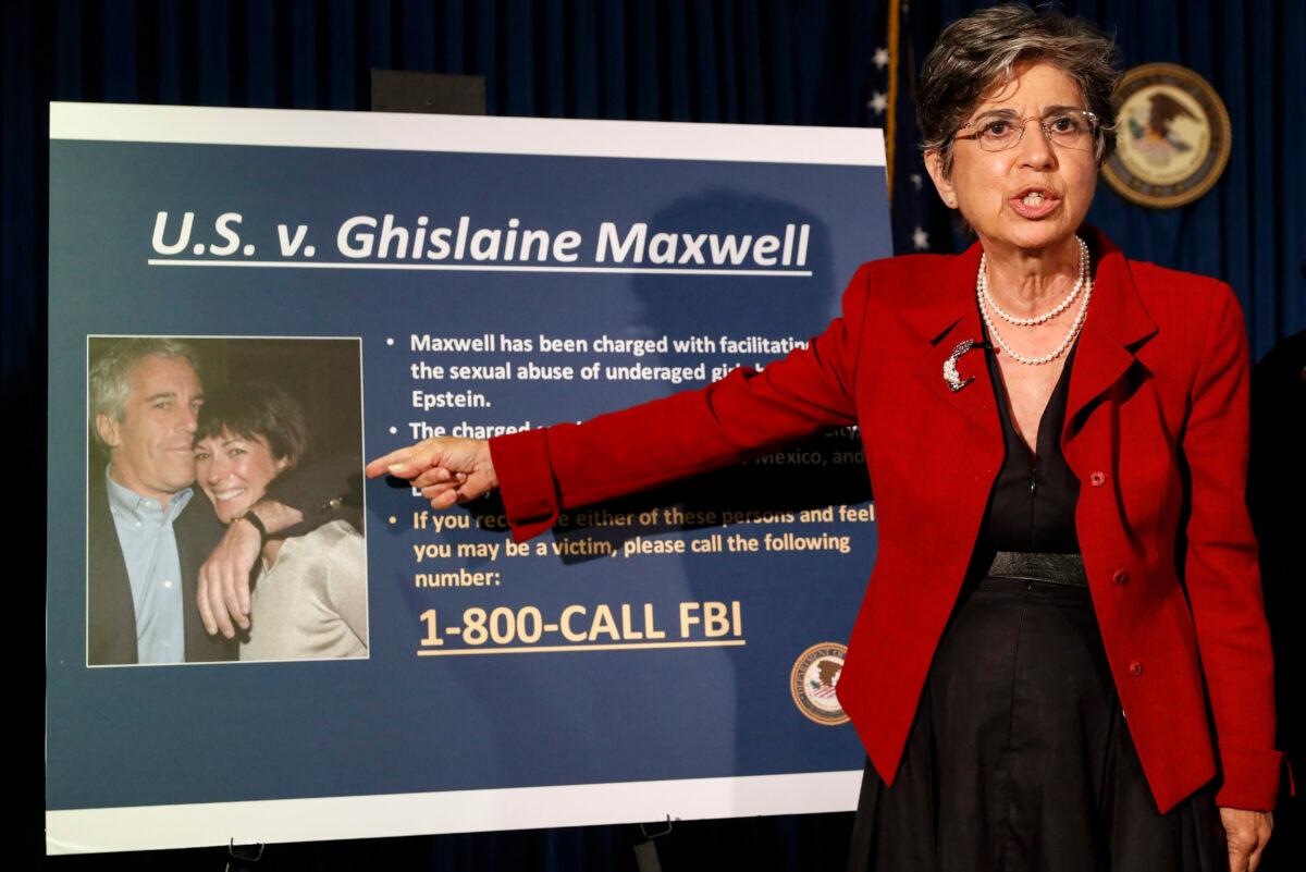Audrey Strauss, Acting United States Attorney for the Southern District of New York, points to a photo of Jeffrey Epstein and his ex-girlfriend Ghislaine Maxwell, on July 2, 2020. (John Minchillo/AP Photo)