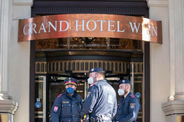 Police officers stay in front of the 'Grand Hotel Wien' where closed-door nuclear talks with Iran take place, in Vienna, Austria, on April 9, 2021. (Florian Schroetter/AP Photo)