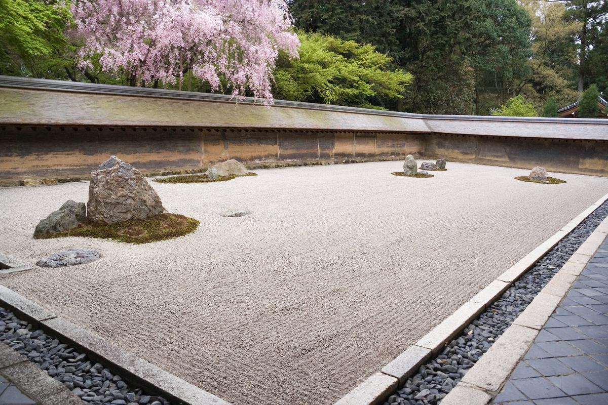 The garden at the Zen temple of Ryoan-ji (Temple of the Dragon at Peace) is considered one of the best examples of its kind. The garden style is kare-sansui, or dry landscape, and consists of large rocks and polished river stones carefully arranged and raked to facilitate meditation. (Cquest/CC BY-SA 2.5)