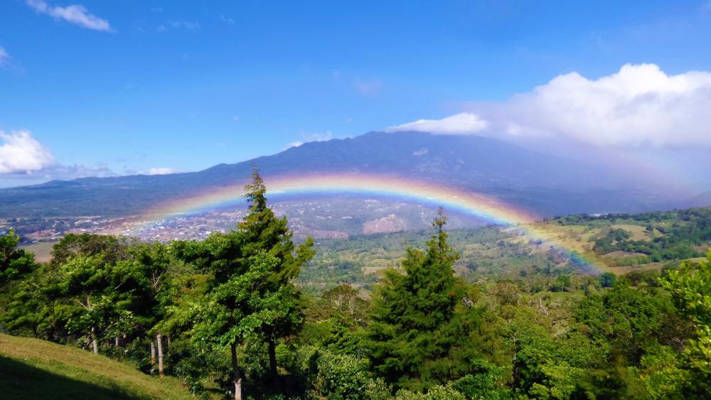 A rainbow with the 11,500-foot Volcano Barú in the background at Boquete. Panama. (Stika/ Shutterstock)