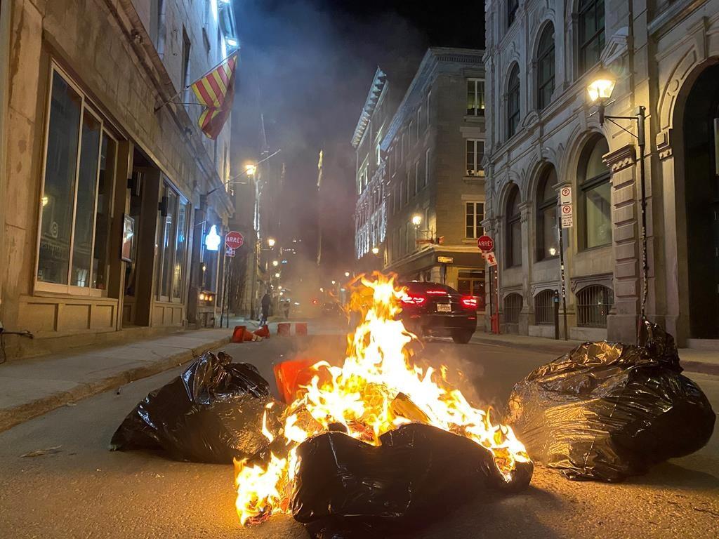 Montreal Businesses Clean Up After Anti-Curfew Protest Mayhem