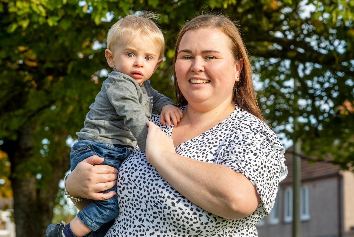 Claire Cowen, 33, and her son Lewis. (SWNS)